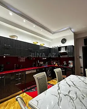 Satılır 4 otaqlı mənzil 165 m²