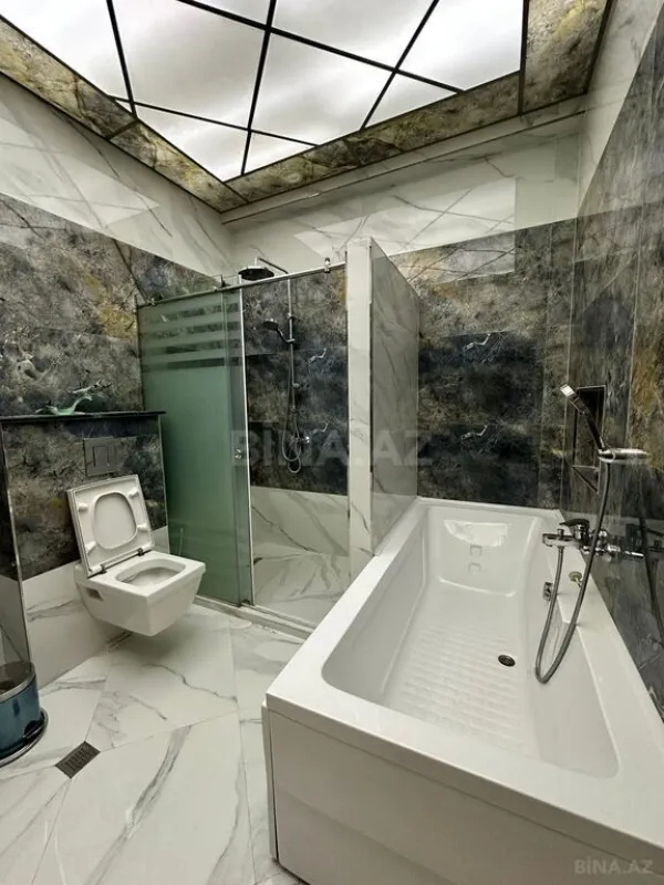 Satılır 4 otaqlı mənzil 230 m²