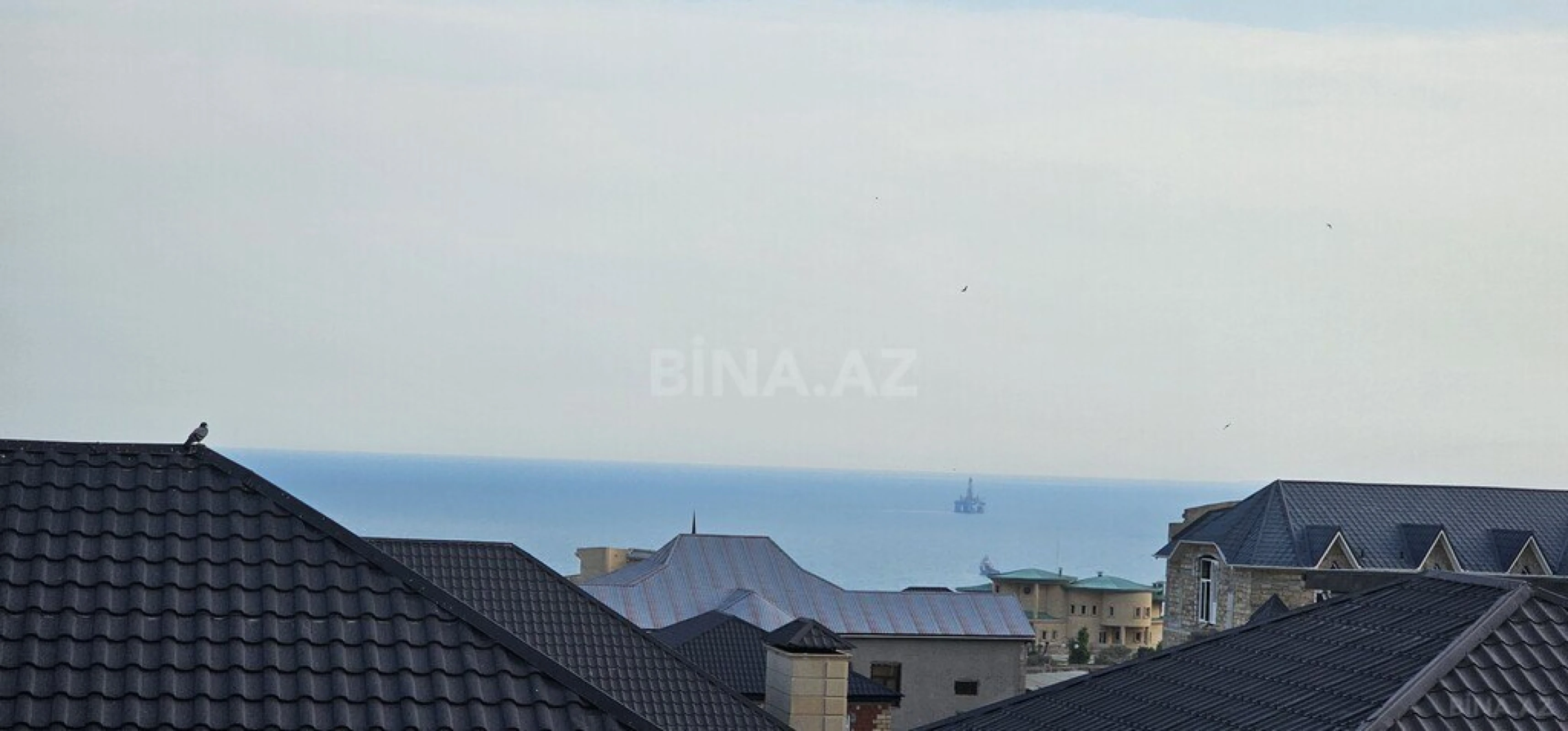 Satılır 9 otaqlı həyət evi 600 m²