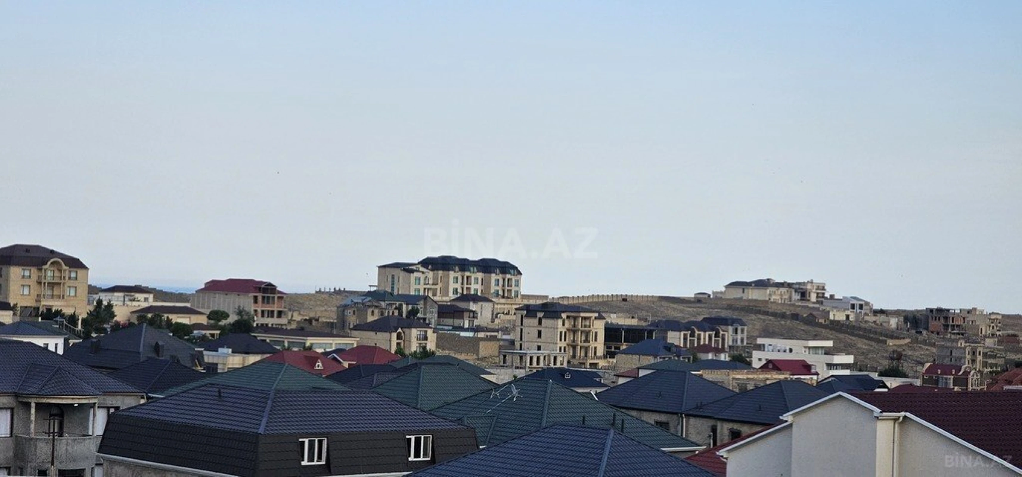 Satılır 9 otaqlı həyət evi 600 m²