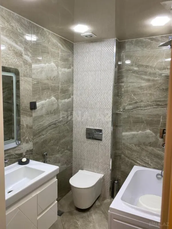 Satılır 4 otaqlı mənzil 183 m²