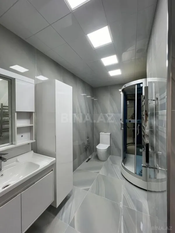Satılır 4 otaqlı mənzil 210 m²