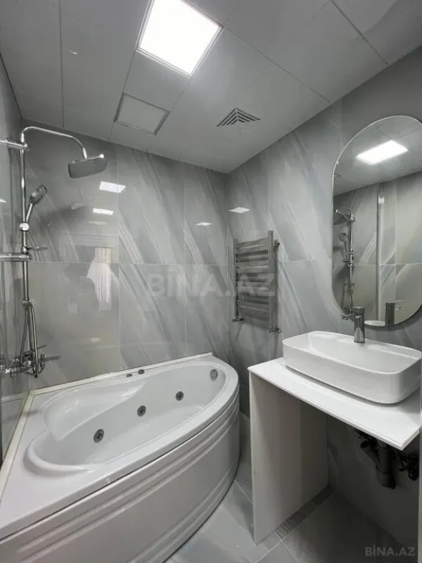 Satılır 4 otaqlı mənzil 210 m²