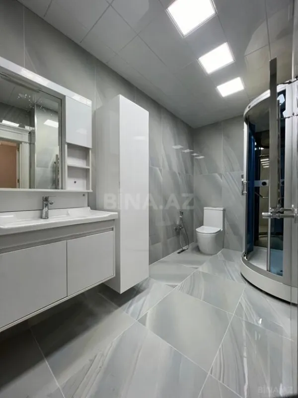 Satılır 4 otaqlı mənzil 210 m²