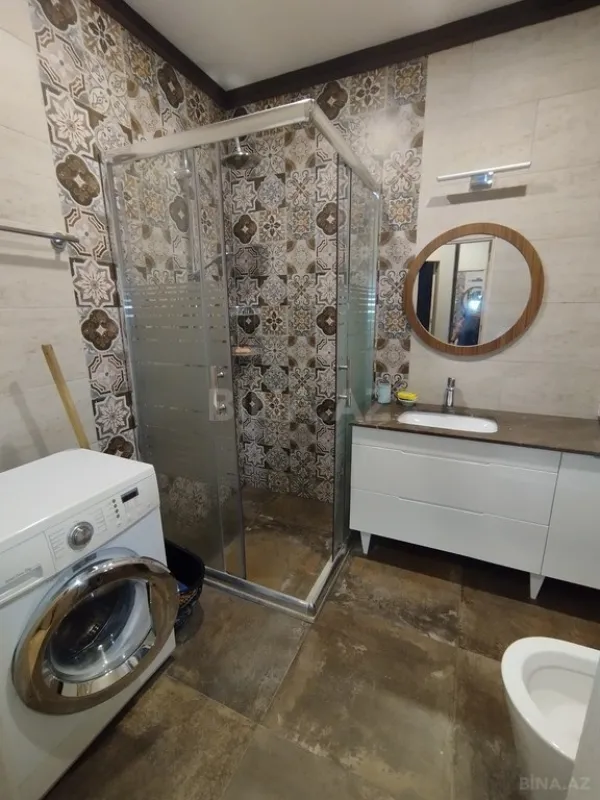 Satılır 4 otaqlı mənzil 130 m²