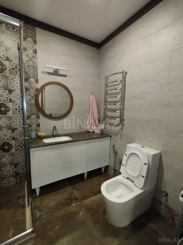 Satılır 4 otaqlı mənzil 130 m²