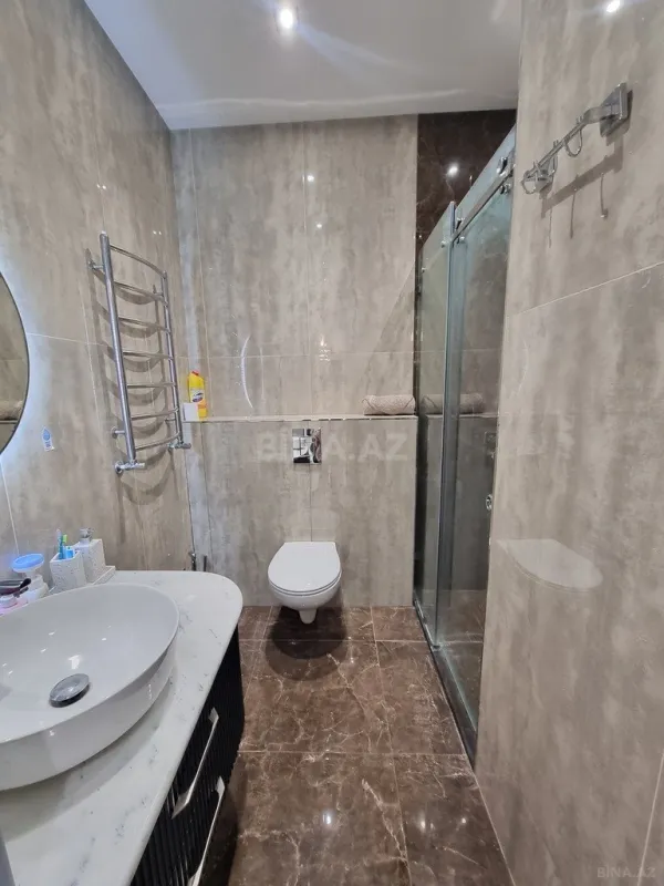 Satılır 3 otaqlı mənzil 165 m²