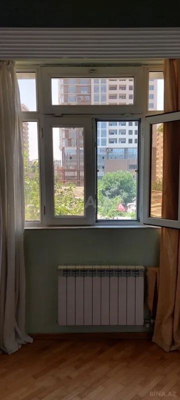 Satılır 4 otaqlı mənzil 112 m²