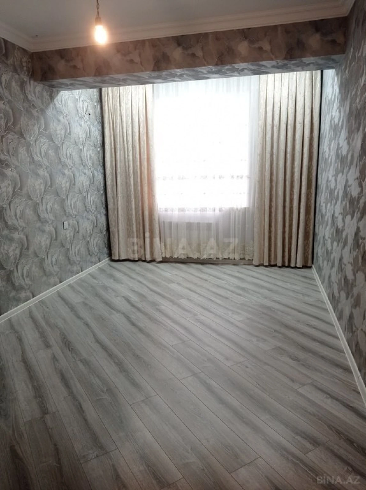 Satılır 4 otaqlı mənzil 128 m²