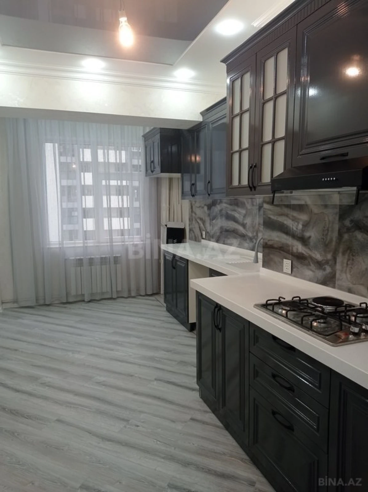 Satılır 4 otaqlı mənzil 128 m²