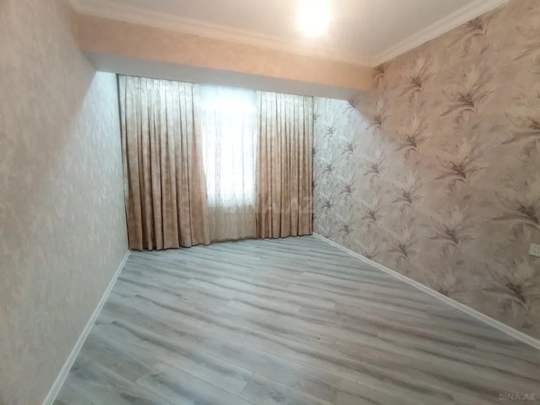 Satılır 4 otaqlı mənzil 128 m²