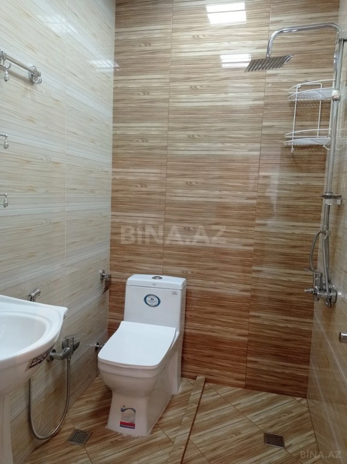 Satılır 4 otaqlı mənzil 128 m²