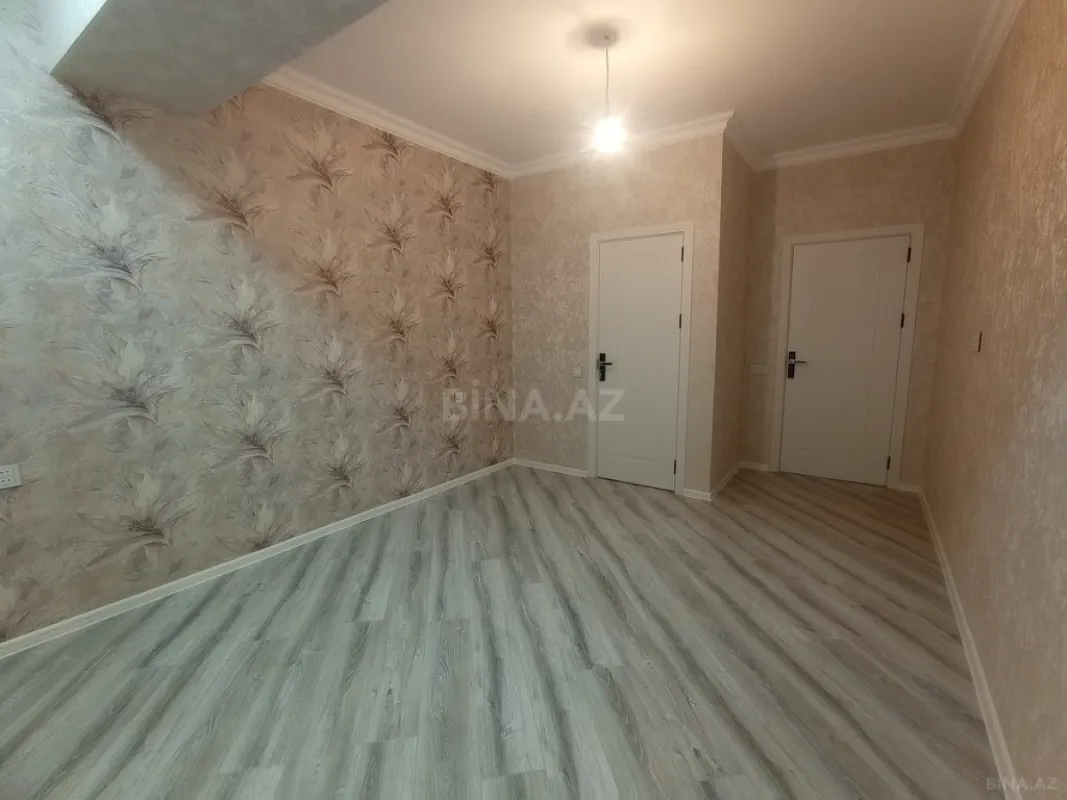 Satılır 4 otaqlı mənzil 128 m²