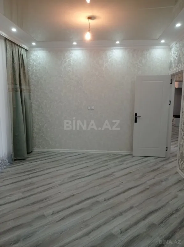 Satılır 4 otaqlı mənzil 128 m²