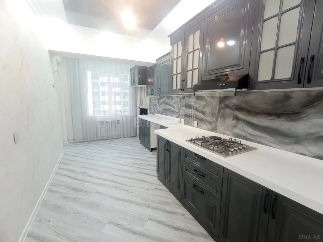 Satılır 4 otaqlı mənzil 128 m²