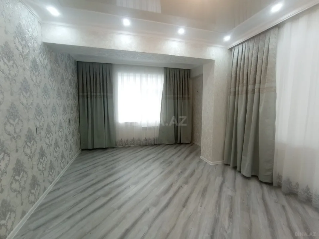 Satılır 4 otaqlı mənzil 128 m²
