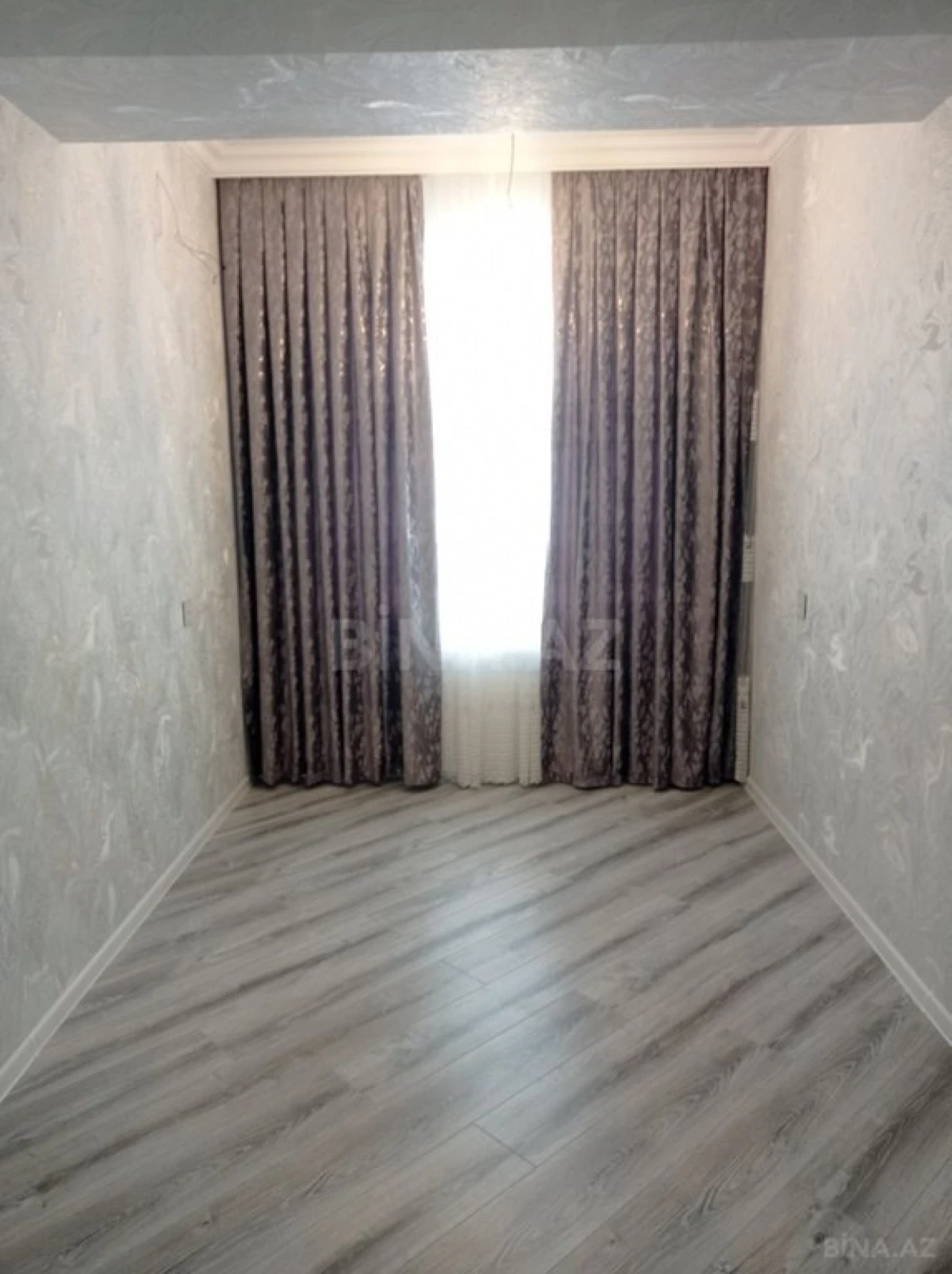 Satılır 4 otaqlı mənzil 128 m²