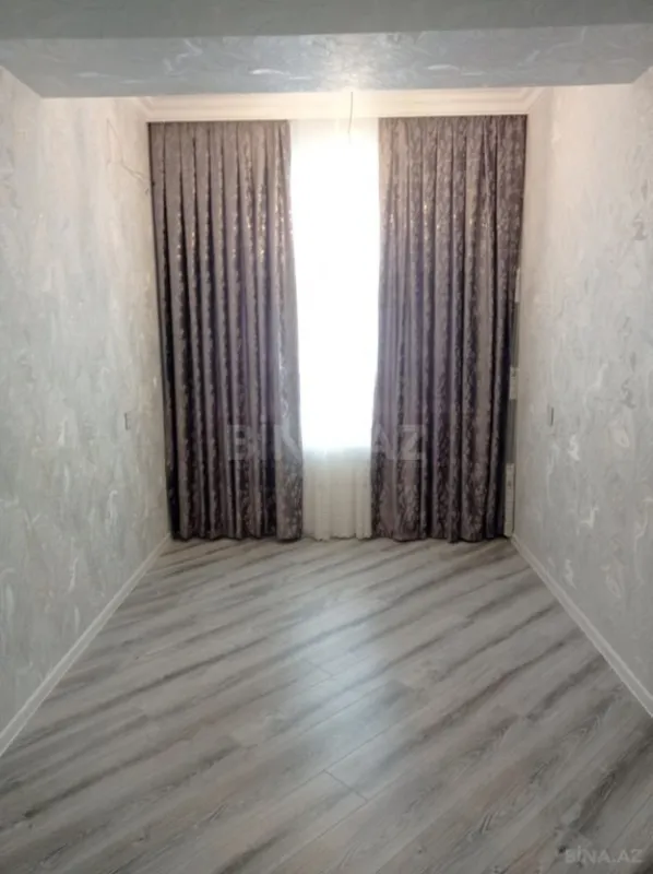 Satılır 4 otaqlı mənzil 128 m²