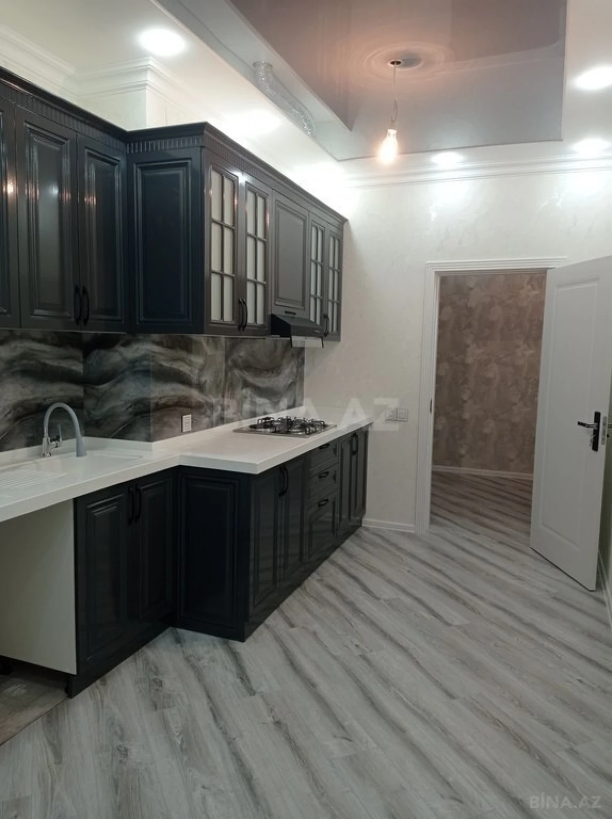 Satılır 4 otaqlı mənzil 128 m²