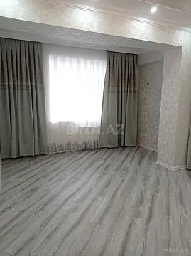 Satılır 4 otaqlı mənzil 128 m²