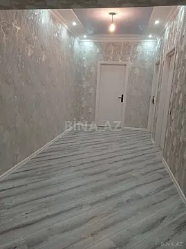 Satılır 4 otaqlı mənzil 128 m²