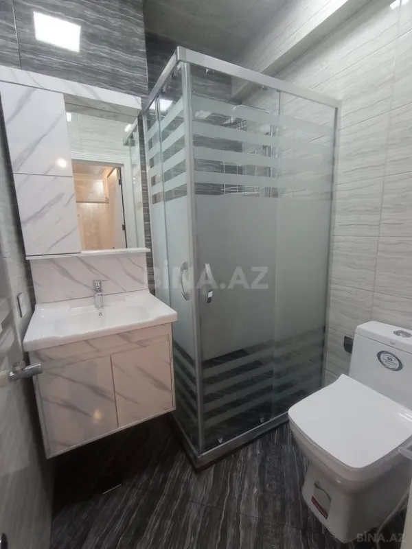 Satılır 4 otaqlı mənzil 128 m²