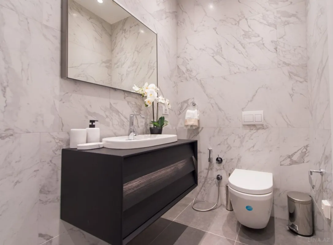 Satılır 3 otaqlı mənzil 123.7 m²