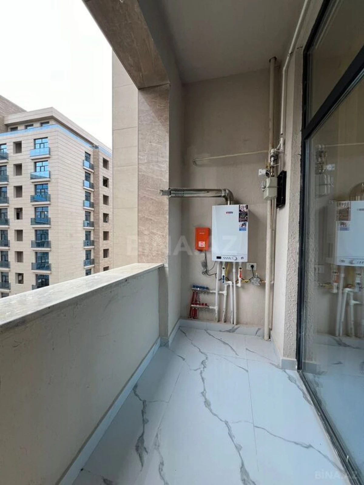 Satılır 2 otaqlı mənzil 70.8 m²