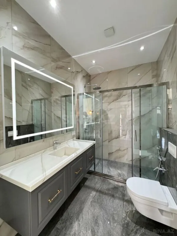 Satılır 4 otaqlı mənzil 205 m²