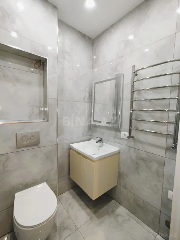 Satılır 2 otaqlı mənzil 70.8 m²
