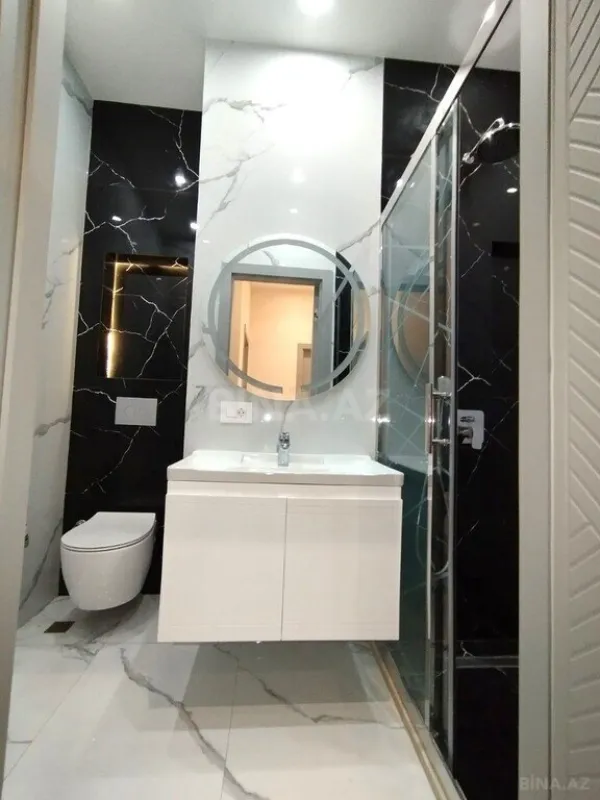 Satılır 2 otaqlı mənzil 90.9 m²