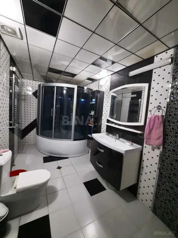 Satılır 4 otaqlı mənzil 171 m²