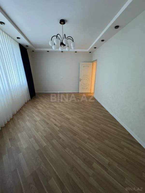 Satılır 4 otaqlı mənzil 134 m²