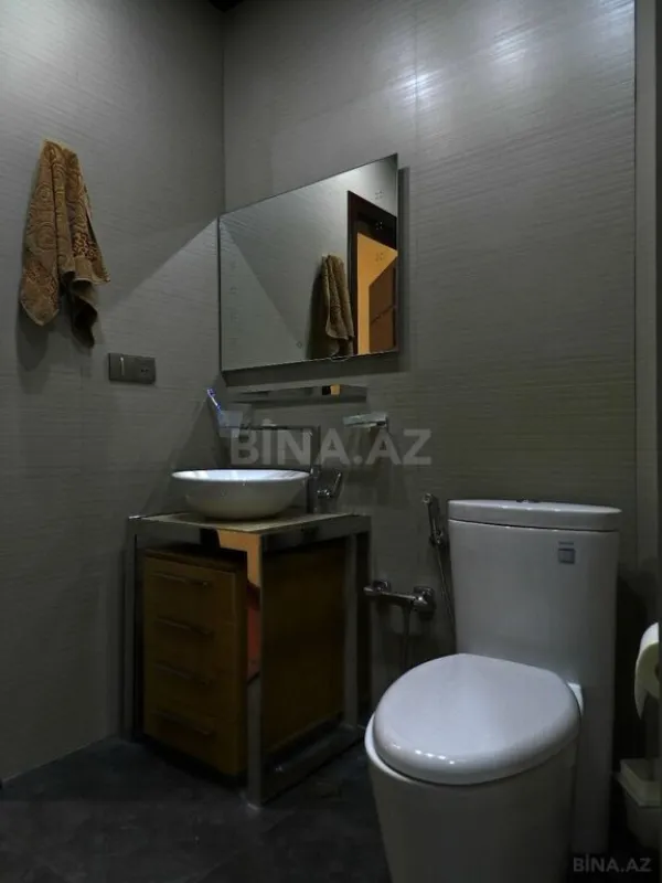 Satılır 4 otaqlı mənzil 172 m²