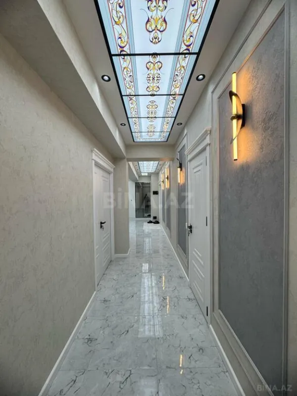 Satılır 4 otaqlı mənzil 155 m²