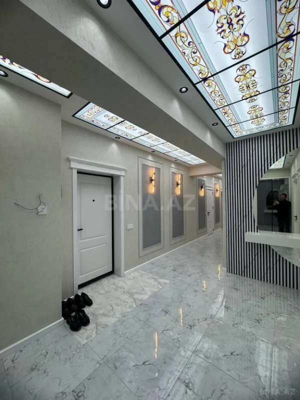 Satılır 4 otaqlı mənzil 155 m²