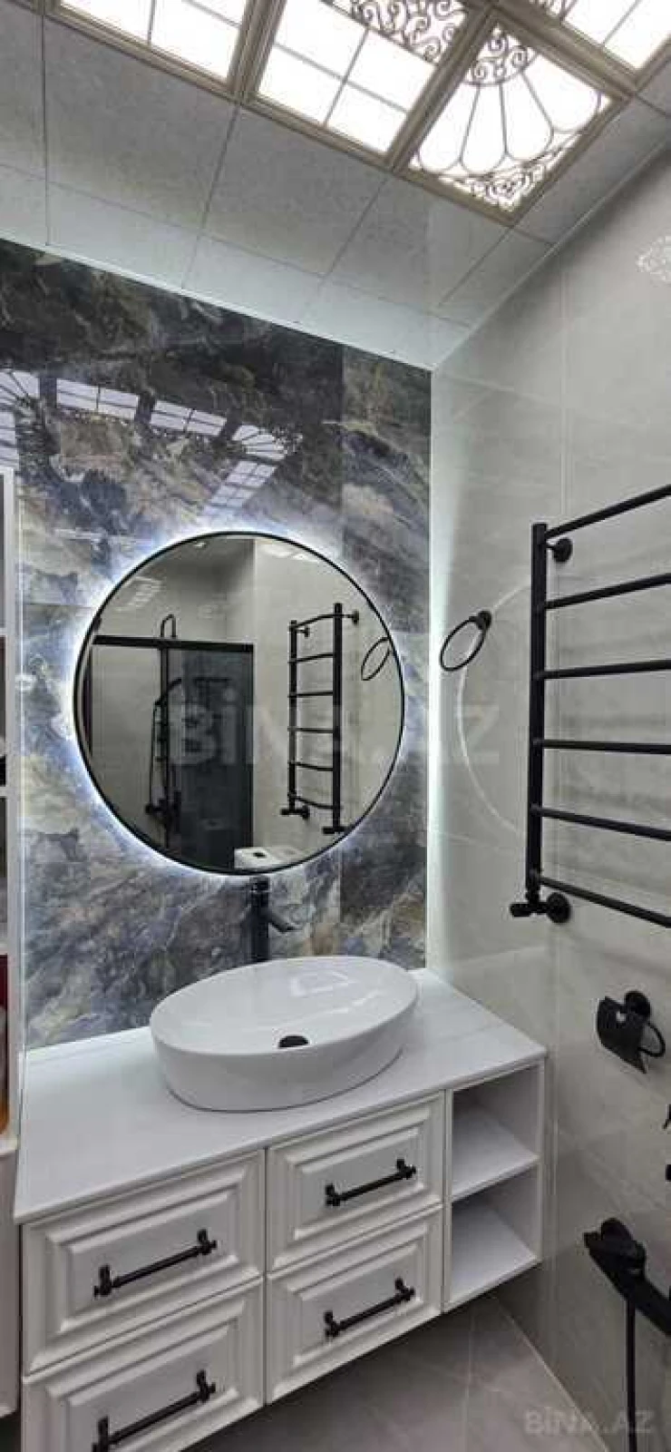 Satılır 3 otaqlı mənzil 141 m²