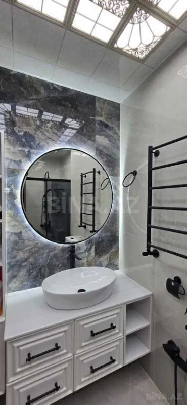 Satılır 3 otaqlı mənzil 141 m²