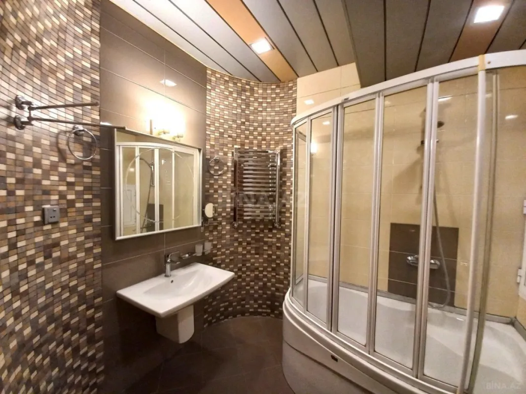 Satılır 4 otaqlı mənzil 148 m²