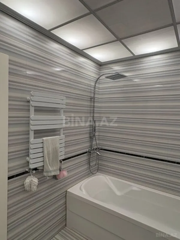 Satılır 4 otaqlı mənzil 165 m²