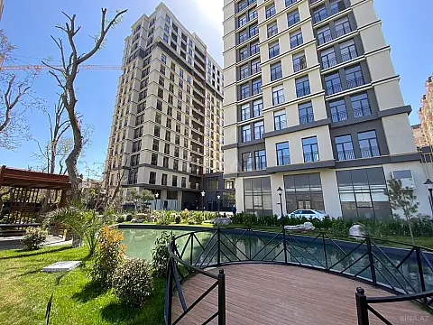 Satılır 4 otaqlı mənzil 166 m²