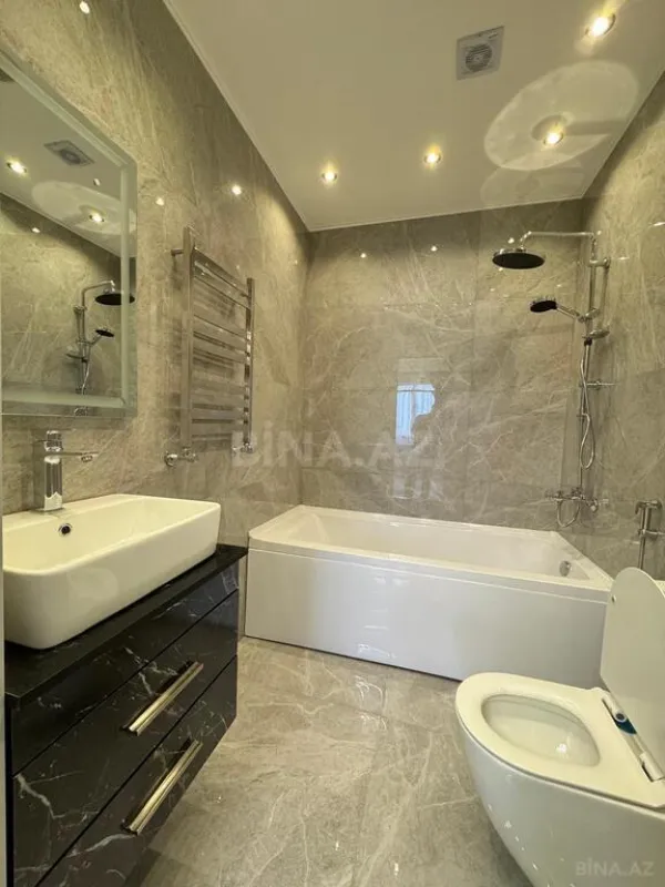 Satılır 4 otaqlı mənzil 150 m²