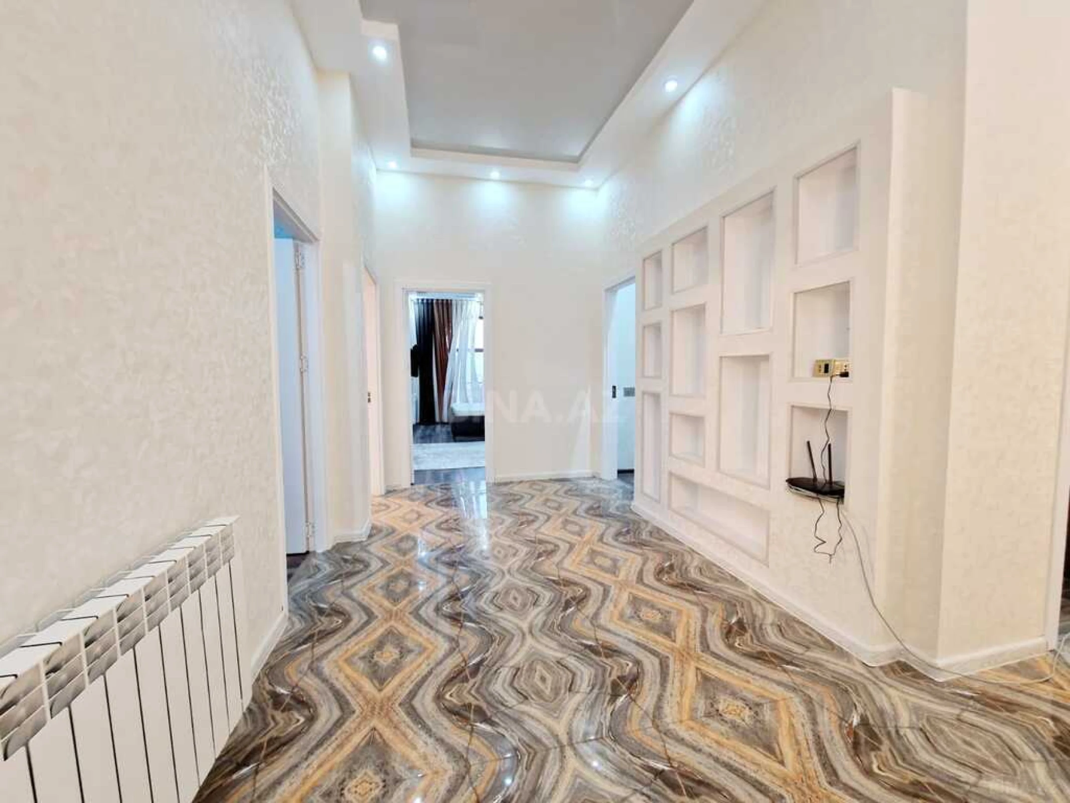 Satılır 4 otaqlı mənzil 165 m²
