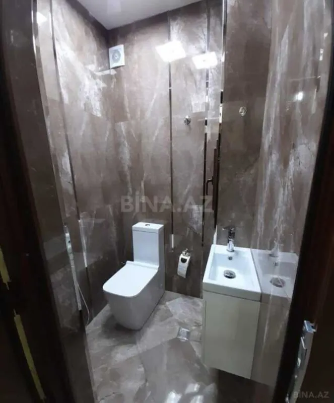 Satılır 4 otaqlı mənzil 105 m²