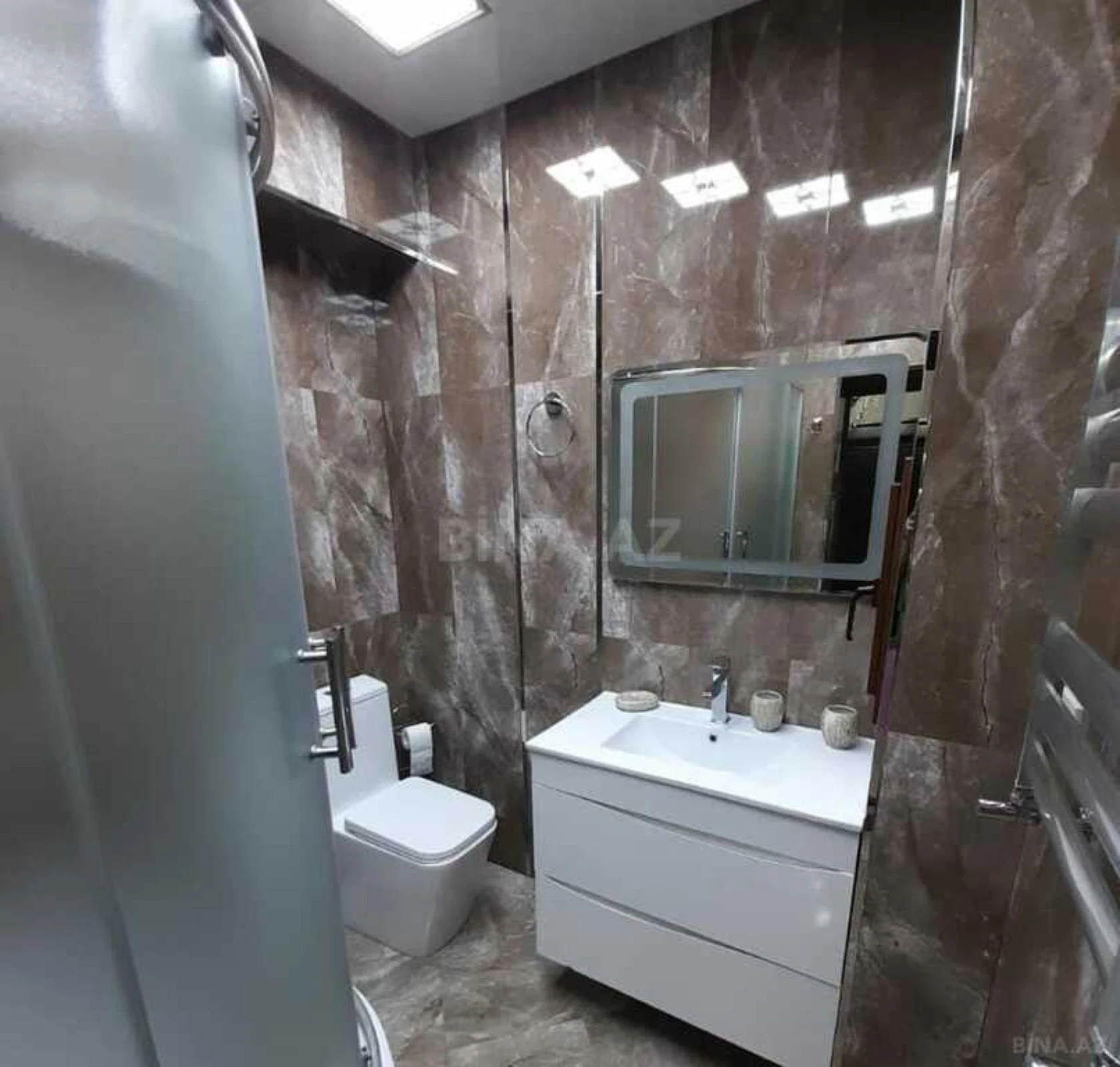 Satılır 4 otaqlı mənzil 105 m²