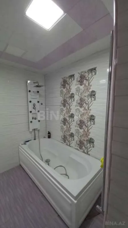 Satılır 4 otaqlı mənzil 210 m²