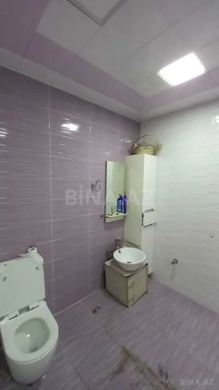 Satılır 4 otaqlı mənzil 210 m²