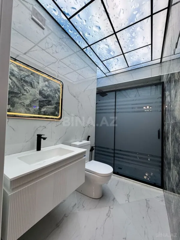 Satılır 4 otaqlı mənzil 155 m²