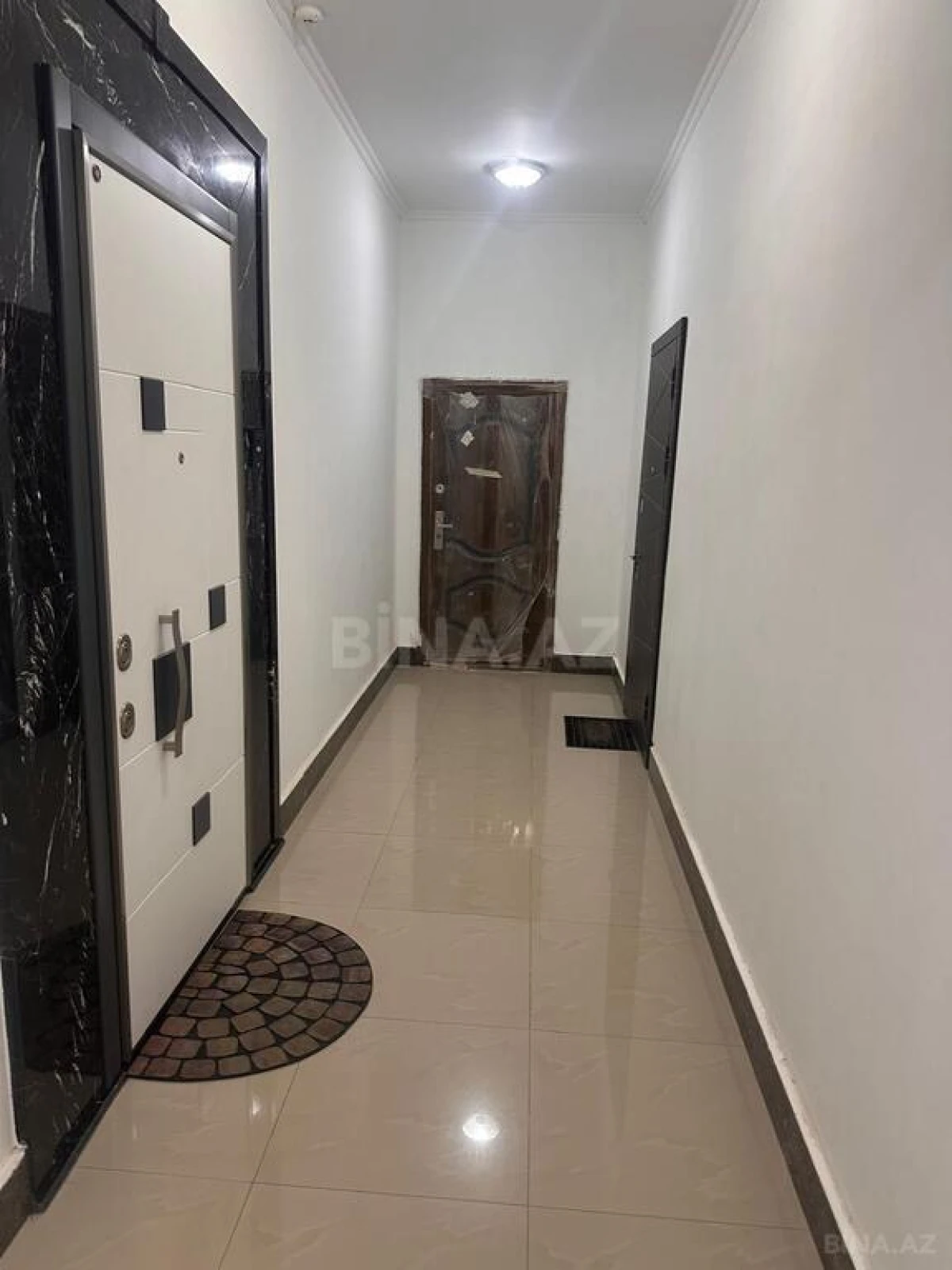 Satılır 4 otaqlı mənzil 164 m²