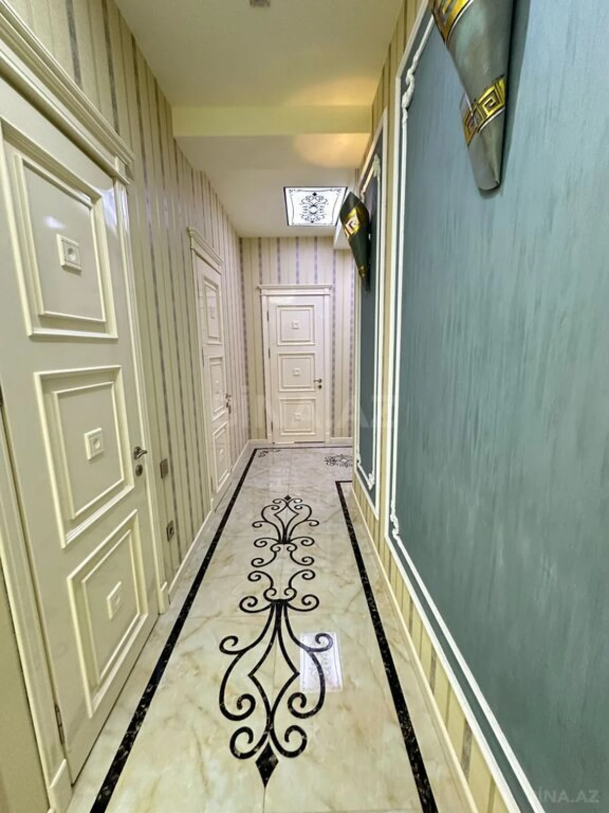 Satılır 4 otaqlı mənzil 180 m²